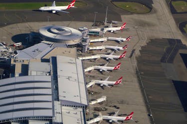 Qantas Airways planes are parked at the domestic terminal at Sydney airport in Australia, July 1, 2017. Picture taken July 1, 2017.  
