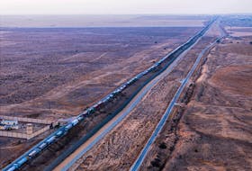 A drone picture of a line of trucks waiting on an Egyptian road along the border with Israel, near the Rafah border crossing with the Gaza Strip May 2, 2024.