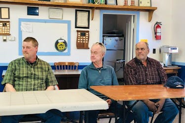 Lakeland Ridges mayoralty candidates, from left, Lance Graham, Leonard Foster and Eric Cummings field questions at an open house in Debec on May 1.