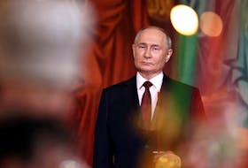 Russian President Vladimir Putin attends the Orthodox Easter service at the Cathedral of Christ the Saviour in Moscow, Russia, May 5, 2024. Sputnik/Valeriy Sharifulin/Pool via