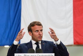 French President Emmanuel Macron delivers a speech after a visit to a factory of manufacturer Valeo in Etaples, near Le Touquet, France May 26, 2020, as part of the launch of a plan to rescue the French car industry. Ludovic Marin/Pool via