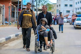 People flee the eastern parts of Rafah after the Israeli military began evacuating Palestinian civilians ahead of a threatened assault on the southern Gazan city, amid the ongoing conflict between Israel and Hamas, in Rafah, in the southern Gaza Strip May 6, 2024.