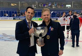 St. John’s natives Travis Crickard (left) and A.J. Murley won gold over the weekend with the Canadian under-18 men’s national team at the 2024 IIHF Under-18 World Championships. Crickard was an assistant coach with the team, while Murley was the team’s equipment manager. Contributed photo