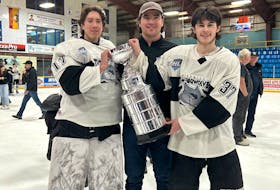 Three Prince Edward Islanders won the 2023-24 Maritime Junior Hockey League championship with the Miramichi Timberwolves on May 2. They are, from left, goaltender Hudson Bradley, general manager Ross Martin and forward Thatcher Hughes. Bradley and Hughes are products of the Charlottetown Bulk Carriers Knights’ major under-18 program. Contributed