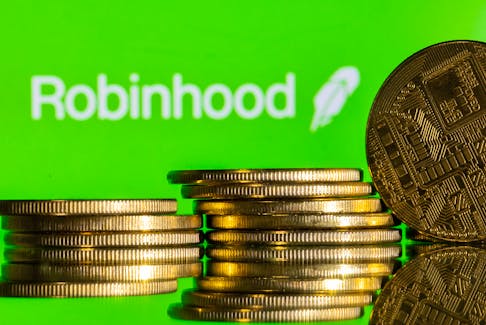 Robinhood logo and representations of cryptocurrency are seen in this illustration taken December 12, 2023.
