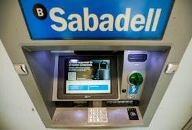 Sabadell bank's logo is seen at an ATM machine outside an office in Barcelona, Spain, September 7, 2021.