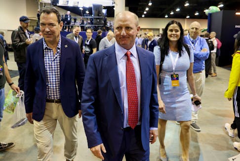 Gregory Abel, the CEO of Berkshire Hathaway Energy and who is designated to succeed Warren Buffett as Berkshire CEO, walks through the crowd at the first in-person annual meeting since 2019 of Berkshire Hathaway Inc in Omaha, Nebraska, U.S. April 29, 2022. 