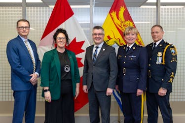 The provincial government has introduced amendments to the Motor Vehicle Act that, if passed, would strengthen the administrative penalties for impaired driving and implement a program to suspend a driver’s licence on the spot. From left: Steve Sullivan, CEO of MADD Canada; Meg Wetmore, Atlantic region victim services manager of MADD Canada; Justice and Public Safety Minister Kris Austin; Assistant Commissioner DeAnna Hill, commanding officer of the RCMP in New Brunswick; and Woodstock police Chief Gary Forward, who is also president of the New Brunswick Association of Chiefs of Police.