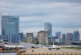 A British Airways Embraer ERJ-190SR passes as it takes off from London City Airport in London, Britain, April 11, 2024.