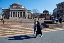 People walk at Columbia University in New York City in New York, U.S., March 9, 2020.