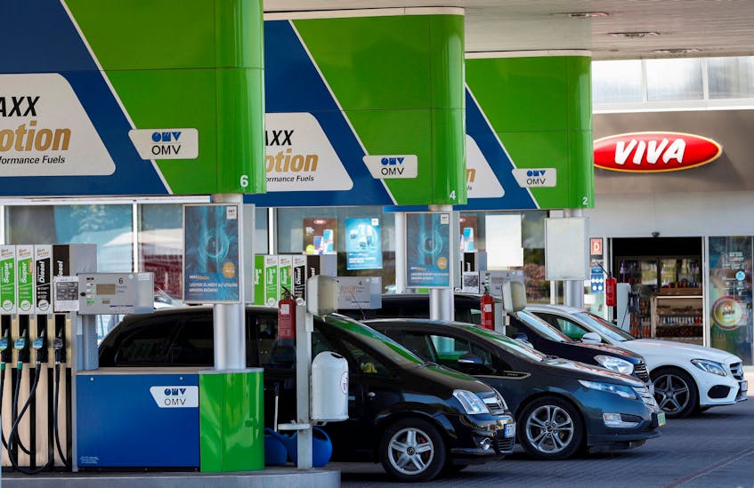 Cars at an OMV petrol station near the Slovakian border in Esztergom, Hungary, June 13, 2022.