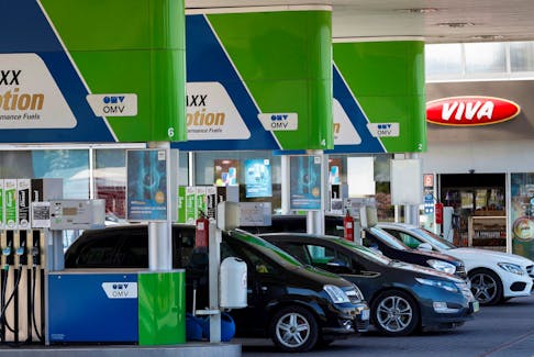Cars at an OMV petrol station near the Slovakian border in Esztergom, Hungary, June 13, 2022.