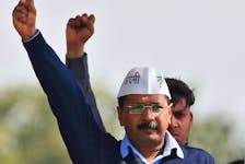 Arvind Kejriwal, chief of Aam Aadmi (Common Man) Party (AAP), shouts slogans after taking the oath as the new chief minister of Delhi during a swearing-in ceremony at Ramlila ground in New Delhi February 14, 2015.