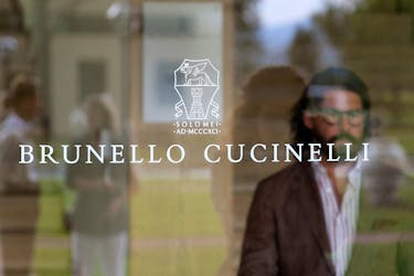 A logo of Brunello Cucinelli is seen on a door at their company headquarters in Solomeo village, near Perugia, Italy, September 4, 2018. 