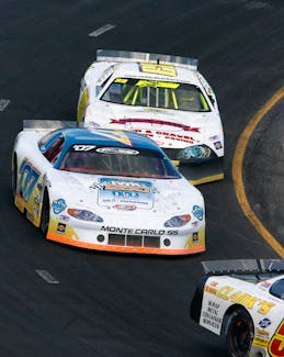 JULY 22, 2007--NASCAR  Regan Smith's car (o7) rounds a turn during the IWK 250 car race at Riverside Speedway in James River Sunday.