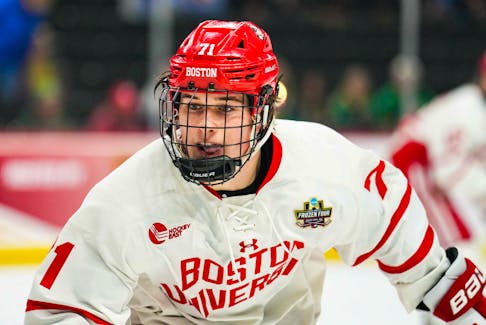 Apr 11, 2024; Saint Paul, Minnesota, USA; Boston U. forward Macklin Celebrini (71) looks on in the semifinals of the 2024 Frozen Four college ice hockey tournament during the first period against the Denver at Xcel Energy Center. Mandatory Credit: Brace Hemmelgarn-USA TODAY Sports/File Photo