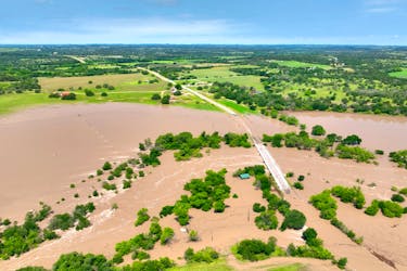 An aerial view of a flooded area, in Brooks Crossing, Texas, U.S., May 5, 2024, in this still image obtained from a handout video.   GW Aerial Photography/Handout via