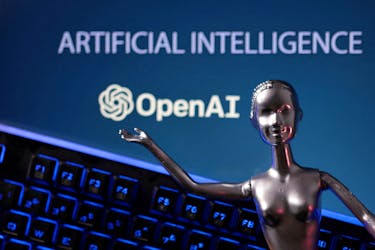 OpenAI logo and AI Artificial Intelligence words are seen in this illustration taken, May 4, 2023.