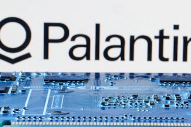 Palantir logo is seen near computer motherboard in this illustration taken January 8, 2024.
