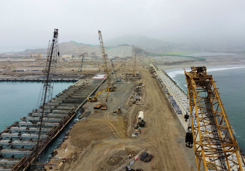 Dragline excavators stand at the construction site of a new Chinese mega port, in Chancay, Peru August 22, 2023.