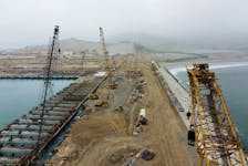 Dragline excavators stand at the construction site of a new Chinese mega port, in Chancay, Peru August 22, 2023.