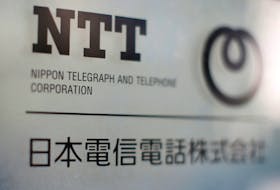 The logo of NTT (Nippon Telegraph and Telephone Corporation) is displayed at the company office in Tokyo, Japan,  July 2, 2018.