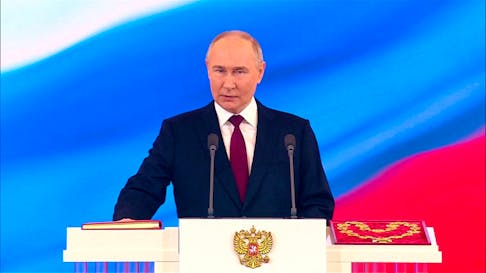 Russian President Vladimir Putin takes the oath during an inauguration ceremony at the Kremlin in Moscow, Russia May 7, 2024, in this still image taken from live broadcast video. Kremlin.ru/Handout via REUTERS