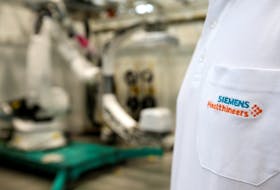 Siemens Healthineers logo is seen on an item of clothing in manufacturing plant in Forchheim near Nuremberg, Germany, October 7, 2016.