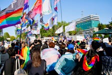 Members of the LGBTQ+ community march in front of the new Presidential office during a protest ahead of the International Day Against Homophobia, Transphobia and Biphobia, in Seoul, South Korea, May 14, 2022. 