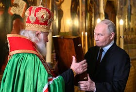 Russian President Vladimir Putin and Patriarch Kirill of Moscow and all Russia attend a prayer service following an inauguration ceremony at the Kremlin's Annunciation Cathedral in Moscow, Russia May 7, 2024. Sputnik/Alexey Maishev/Kremlin via REUTERS