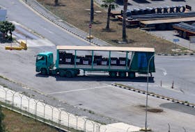 A truck carrying cargo with UAE flags is seen at the port of Larnaca, Cyprus May 8, 2024.