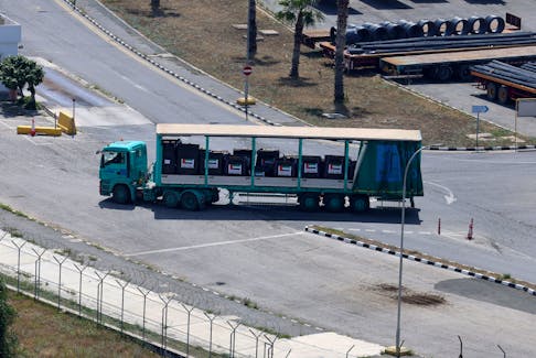 A truck carrying cargo with UAE flags is seen at the port of Larnaca, Cyprus May 8, 2024.