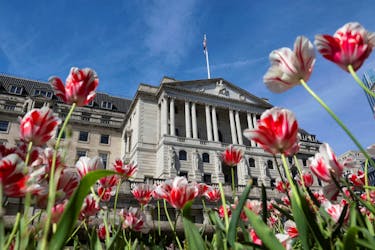 The Bank of England building is seen surrounded by flowers in London, Britain, May 8, 2024.