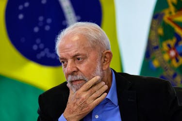 Brazil’s President Luiz Inacio Lula da Silva reacts during a meeting with members of the automotive sector at the Planalto Palace in Brasilia, Brazil, March 14, 2024.