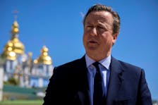 Foreign Secretary David Cameron speaks to a reporter outside St. Michael's Golden-Domed Monastery, amid Russia's attack on Ukraine, in Kyiv, Ukraine, May 2, 2024.