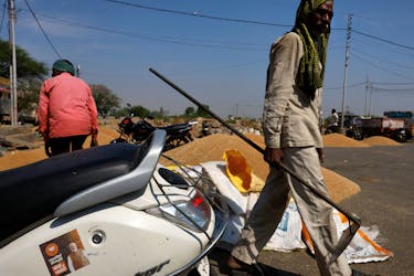 A sticker of India's Prime Minister Narendra Modi is pasted on a scooter at a wholesale grain market in Mathura, in the northern state of Uttar Pradesh, India, April 25, 2024.