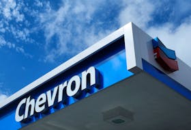 A Chevron gas station sign is seen in Austin, Texas, U.S., October 23, 2023.