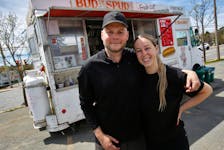 FOR BESWICK STORY:
Kyle Conrod  and Kathleen Poter are seen in  front of their Bud the Spud food truck in a  Sackville Road parking lot in Lower Sackville Wednesday May 8, 2024. the truck, a Sprig Garden Road summer fixture, will not be in it's usual spot thiseason.

TIM KROCHAK PHOTO