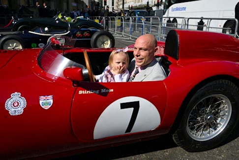 Elliot Moss sits in a vintage sports car formerly piloted by Sir Stirling Moss at a service of Thanksgiving for Sir Stirling Moss's life and work at Westminster Abbey, London, Britain, May 8, 2024.  Paul Grover/Pool via REUTERS