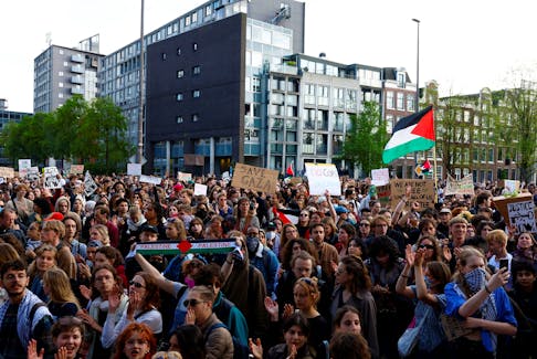 Students and employees of the University of Amsterdam take part in a march against the ongoing conflict between Israel and the Palestinian Islamist group Hamas in Gaza and the University leadership after police broke up a student protest camp overnight, in Amsterdam, Netherlands, May 7, 2024.