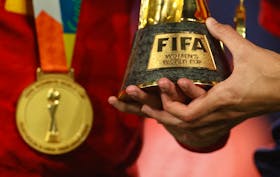 Soccer Football - FIFA Women's World Cup Australia and New Zealand 2023 - Final - Spain v England - Stadium Australia, Sydney, Australia - August 20, 2023 General view of a Spain player holding the World Cup trophy after the match