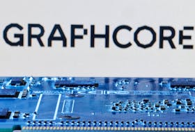 Graphcore logo is seen near computer motherboard in this illustration taken January 8, 2024.