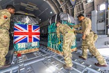 British Army personnel from 47 Air Despatch Squadron load humanitarian aid onto an A400M Atlas military plane as part of an action to address the plight of Palestinian people in Gaza, at an unspecified location in Jordan April 9 2024. UK MOD/Handout via
