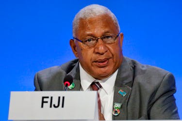 Fiji's Prime Minister Josaia Voreqe 'Frank' Bainimarama attends a meeting during the UN Climate Change Conference (COP26) in Glasgow, Scotland, Britain, November 2, 2021.