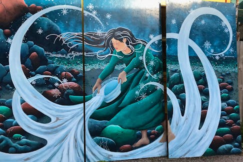 This mural, which was on a building on Harbour Drive for decades, will soon find a new home on the Benevolent Irish Society's building on Harvey Road.
