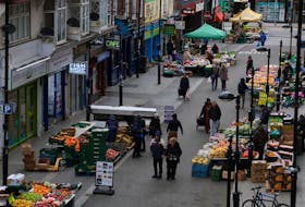 People walk through Surrey Street market in Croydon, south London, Britain, February 26, 2024.