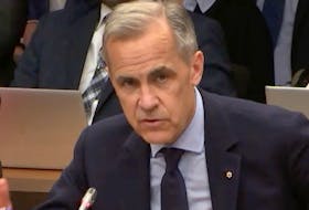 Former Bank of Canada governor Mark Carney appears before the Senate banking committee on Wednesday, May 8, 2024.