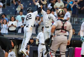 May 8, 2024; Bronx, New York, USA; New York Yankees right fielder Juan Soto (22) celebrates with shortstop Anthony Volpe (11) after hitting a two run home run against the Houston Astros during the first inning at Yankee Stadium. Mandatory Credit: Brad Penner-USA TODAY Sports