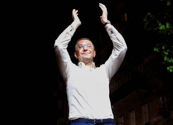 North Macedonian opposition party VMRO-DPMNE leader Hristijan Mickoski applauds as he addresses supporters following the parliamentary elections and second round of the presidential election in Skopje, North Macedonia, May 8, 2024.