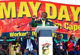 South Africa President Cyril Ramaphosa speaks at the Congress of South African Trade Unions (COSATU) National Worker's Day rally at Athlone Stadium in Cape Town, South Africa, May 1, 2024. REUTERS/Esa Alexander/File Photo
